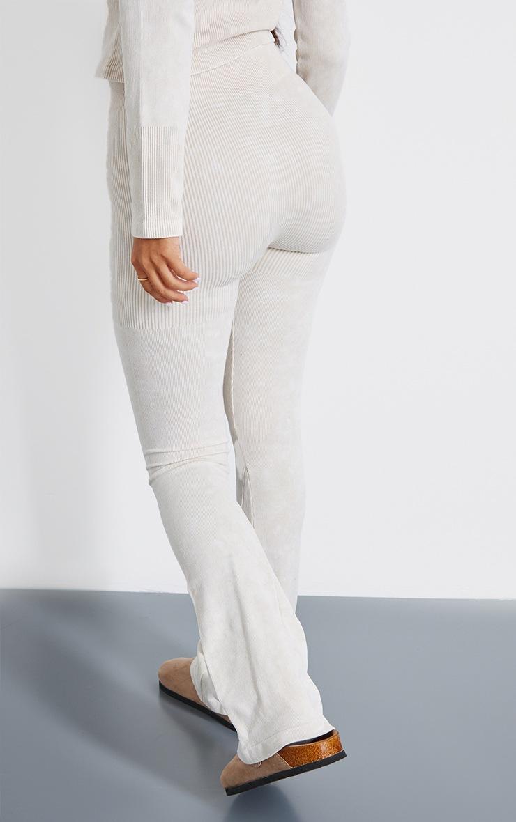Pretty Little Thing Petite Cream Faded Snatched Rib Button Detail Flare Leggings
