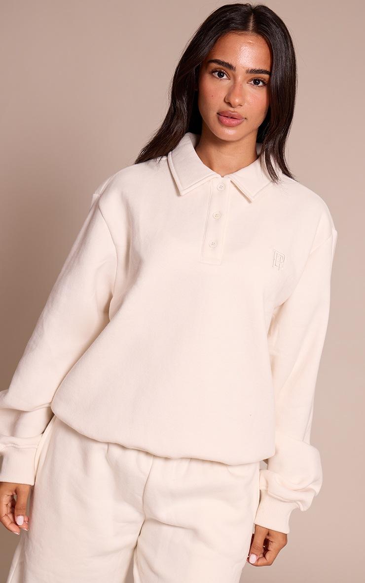 Pretty Little Thing Petite Cream Prettylittlething Polo Sweatshirt