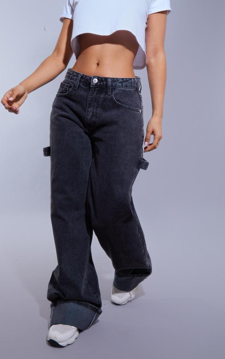 Pretty Little Thing Petite Washed Black Wide Leg Jeans With Strap Detail