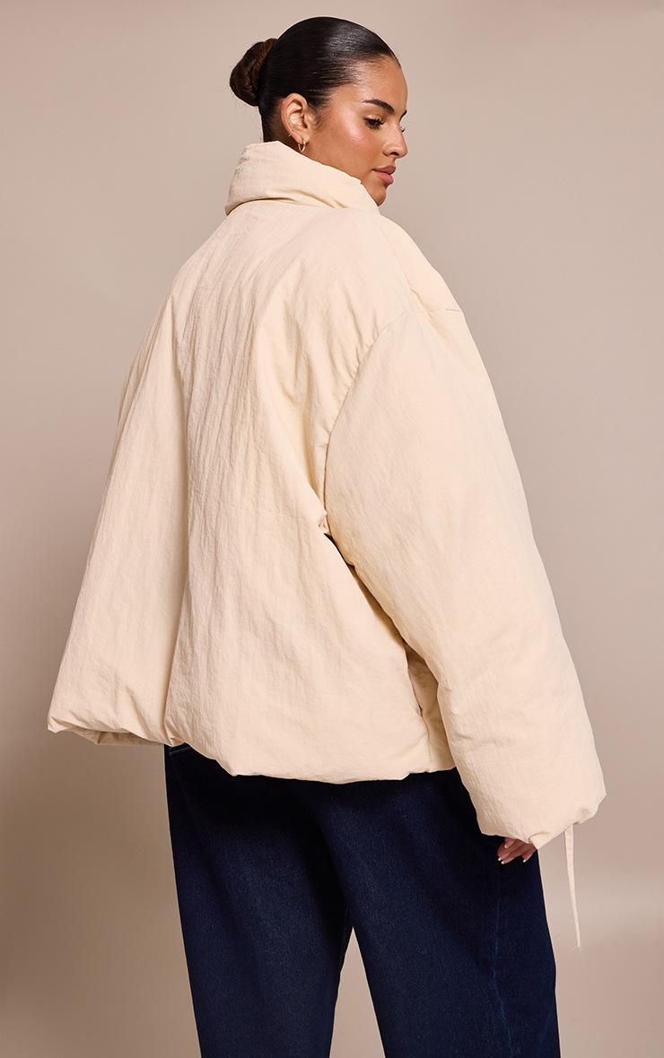 Pretty Little Thing Plus Cream High Neck Tie Waist Quilted Jacket
