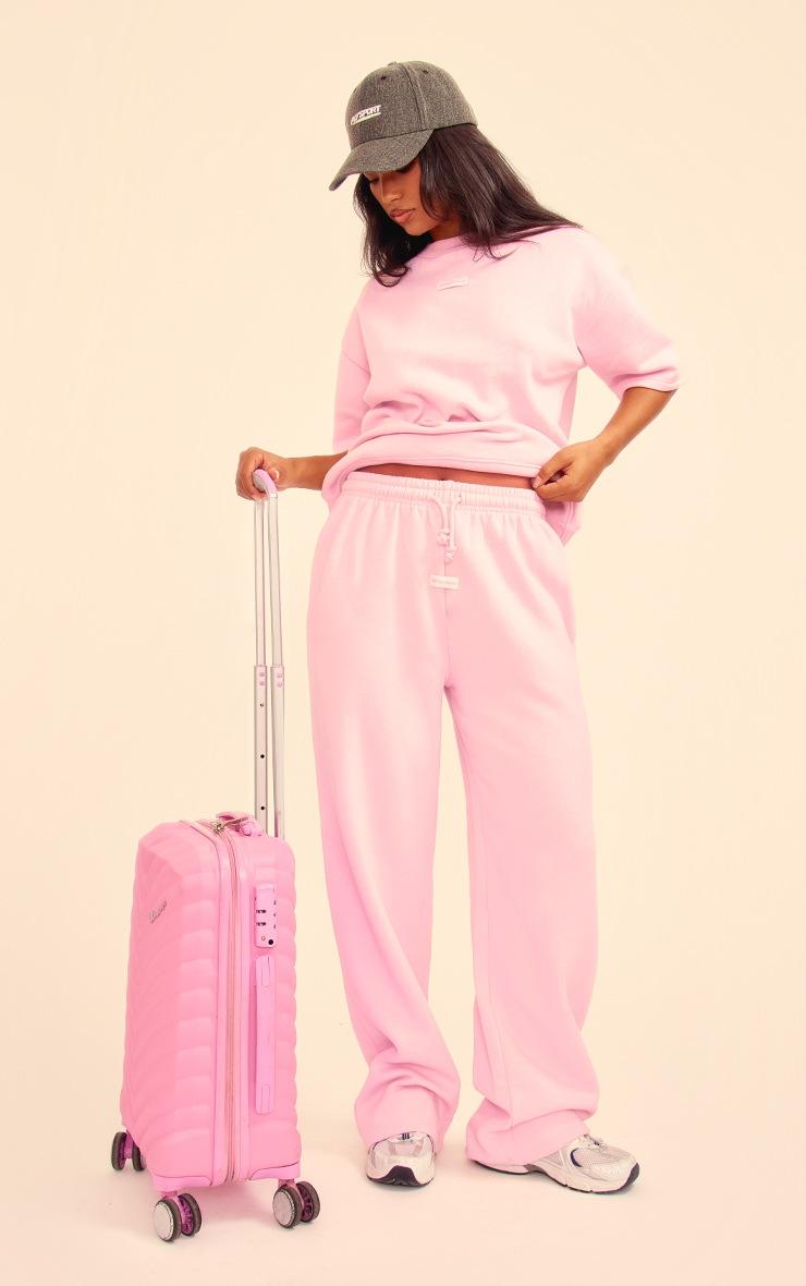Pretty Little Thing PRETTYLITTLETHING Baby Pink Badge Detail Mid Rise Wide Leg Sweatpants