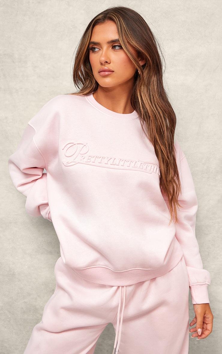 Pretty Little Thing PRETTYLITTLETHING Baby Pink Embossed Graphic Oversized Sweatshirt