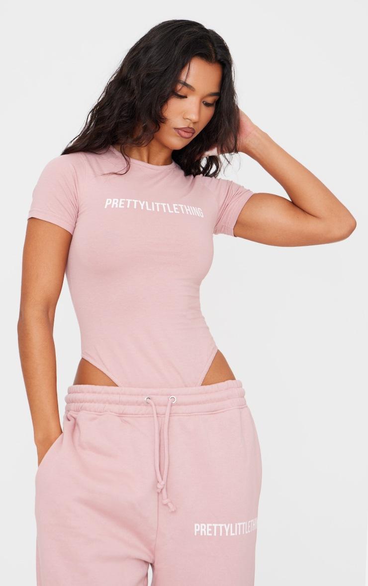 Pretty Little Thing PRETTYLITTLETHING Light Pink Logo Short Sleeve Bodysuit