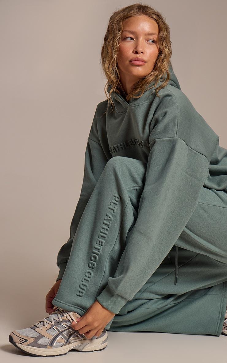 Pretty Little Thing PRETTYLITTLETHING Sage Athletics Club Embossed Straight Leg Sweatpants