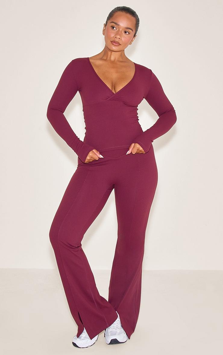 Pretty Little Thing Shape Wine Sculpt Active Wrap V Neck Long Sleeve Top