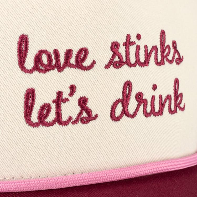 Primitives By Kathy Love Stinks Let's Drink Trucker Hat
