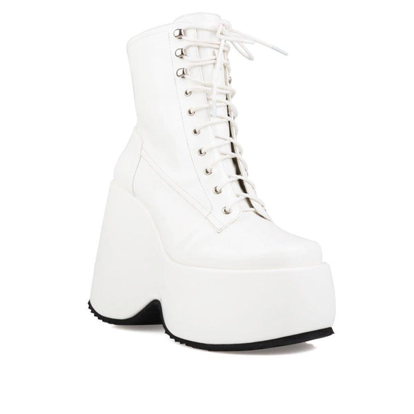 Privileged By J.c. Dossier Aheela White Platform Bootie