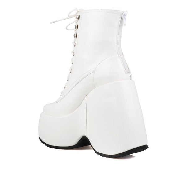 Privileged By J.c. Dossier Aheela White Platform Bootie