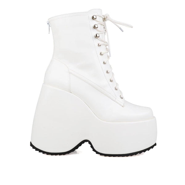 privileged by j.c. dossier Aheela White Platform Bootie