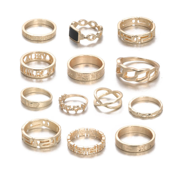 Privileged By J.c. Dossier Bold Zodiac Rings Set In Gold