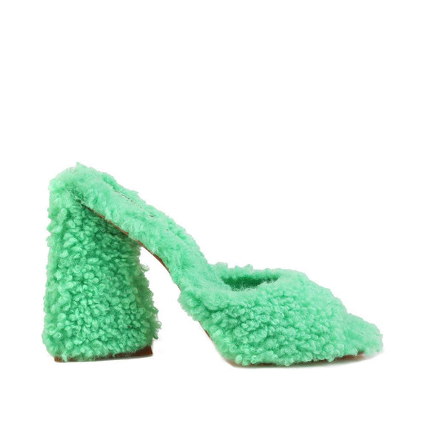 privileged by j.c. dossier Chandlar Green Vegan Shearling Heel