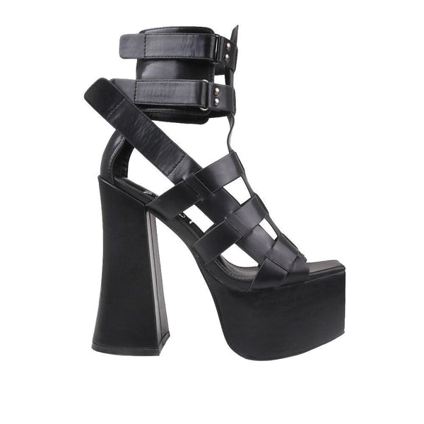 privileged by j.c. dossier Glorify Black Platform Heels