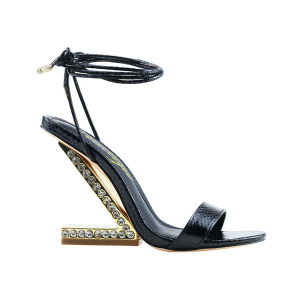 privileged by j.c. dossier Jrue Gold Sculptural Heels