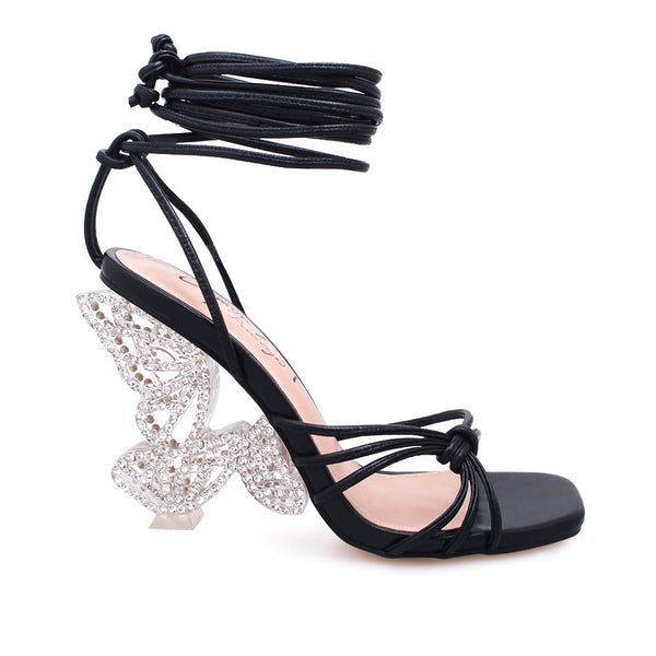 privileged by j.c. dossier Kizzy White Butterfly Wing Heel