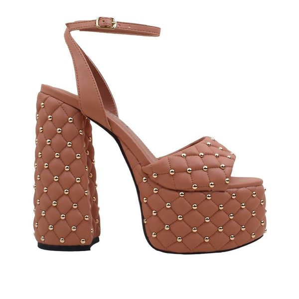 privileged by j.c. dossier Lanzi Brown Quilted Platform Heels