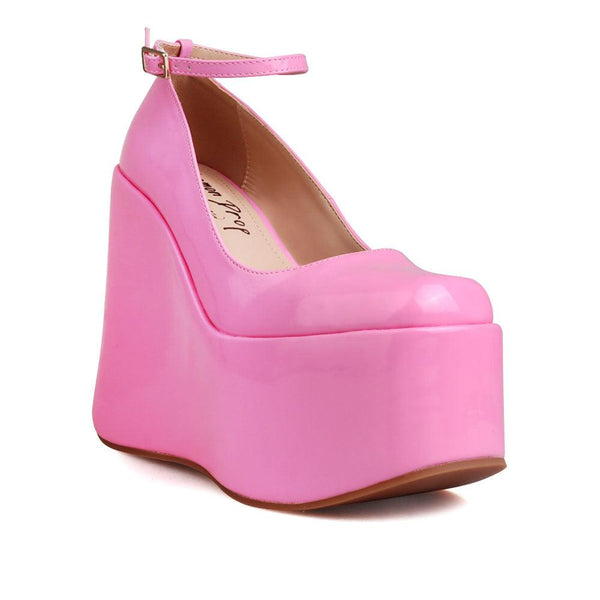 Privileged By J.c. Dossier Munoz Pink Platform Heels