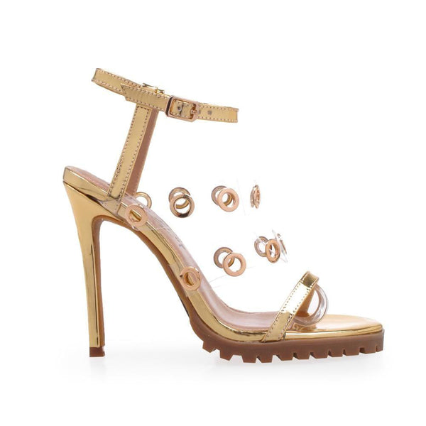 privileged by j.c. dossier Myriad Gold Clear Vinyl Heels