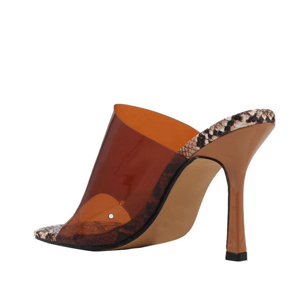 Privileged By J.c. Dossier Nadim Brown Vinyl Heel - Bold & Sculptural