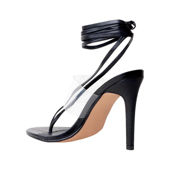 Privileged By J.c. Dossier Barer Black Vinyl Heel