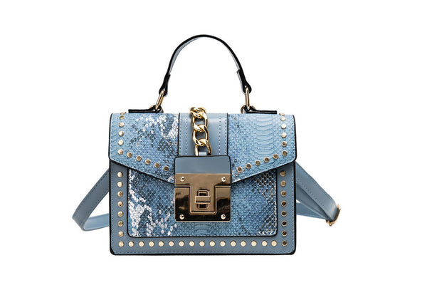 privileged by j.c. dossier Styr Clasp Blue Handbag