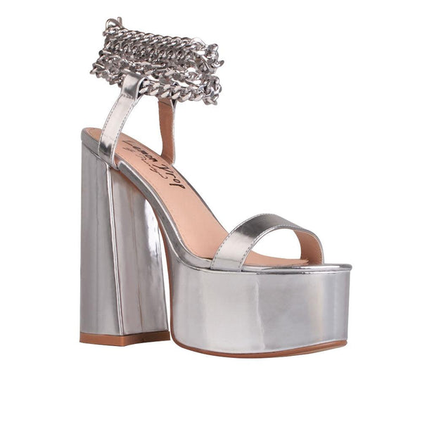 Privileged By J.c. Dossier Valleyheart Silver Platform Heels