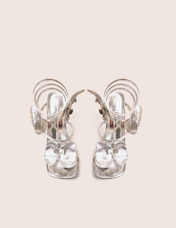 Public Desire Lotus Silver Mirror & Silver Flower Trim Wrap Around Flared Stiletto High Heels