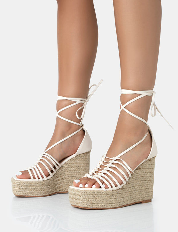 Public Desire Reece Wide Fit Ecru Pu Knot Strap Lace Up Raffia Wedge Heels