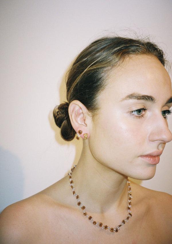 Pura Utz Brown Flower Ear Stick