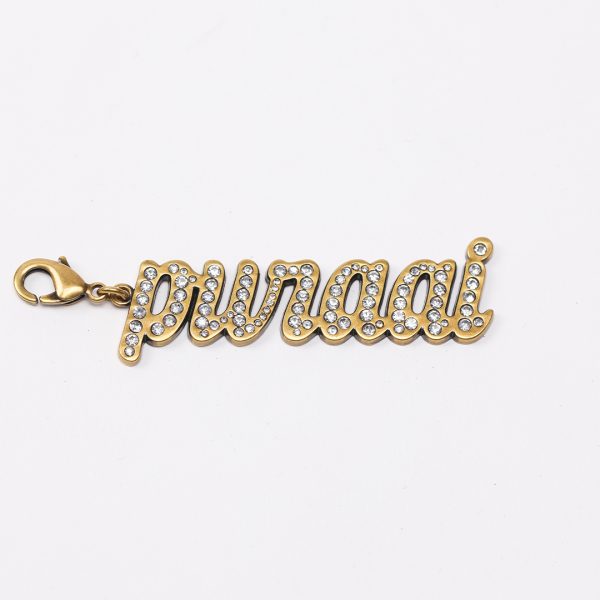 puraai CHARM PURAAI STONES “PURAAI” charm old gold with diamond stones puraai CHARM PURAAI STONES “PURAAI” charm old gold with diamond stones