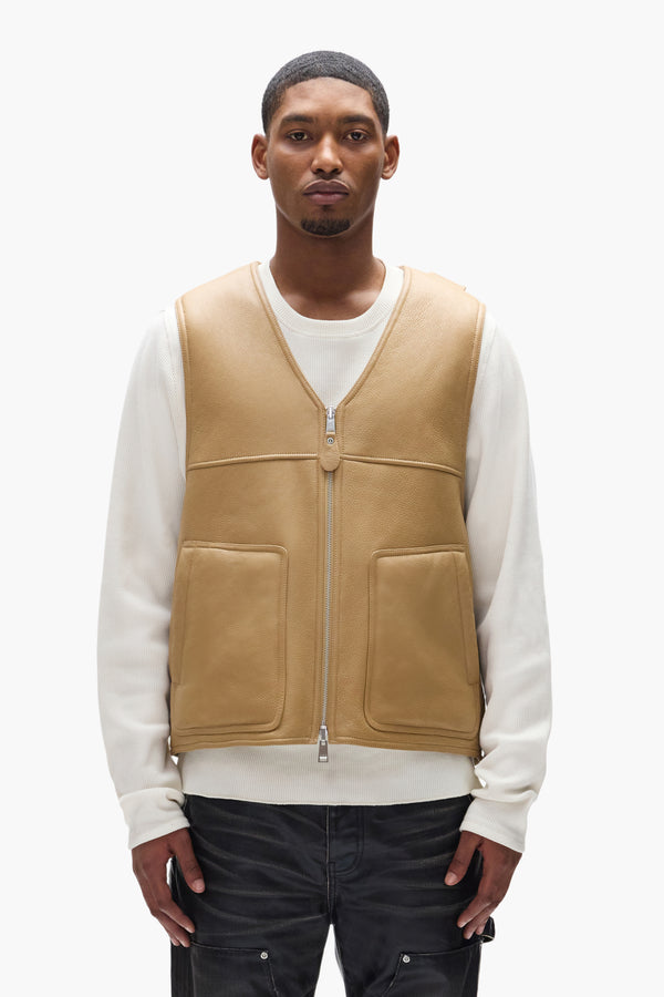 purple brand Slab Wordmark Shearling Vest Tan