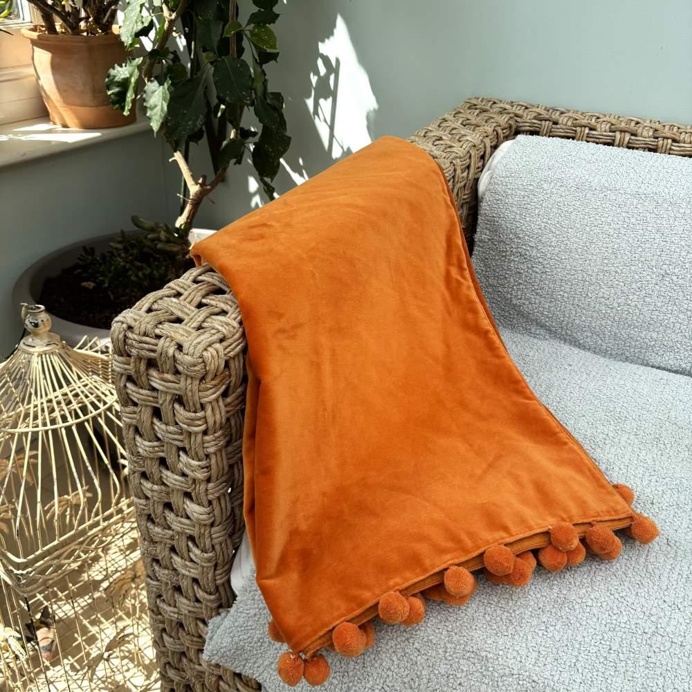 Ragged Rose Orange Velvet Pompom Throw