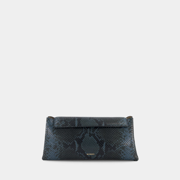 ree projects ELIEZE CLUTCH - PYTHON - BLUE BLACK