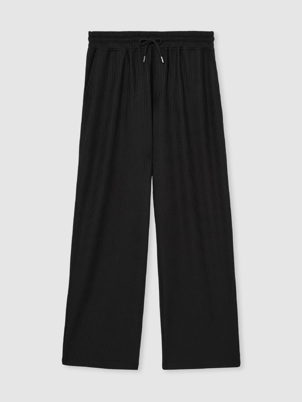 Reiss Textured-Knit Tapered Trousers In Black