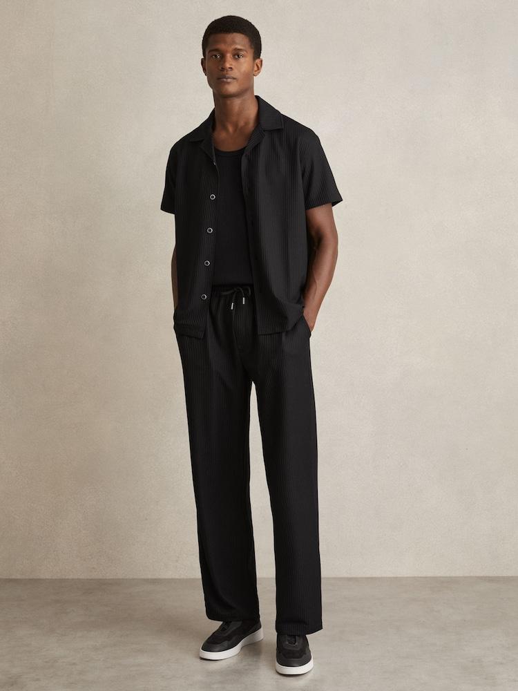 reiss Textured-Knit Tapered Trousers in Black