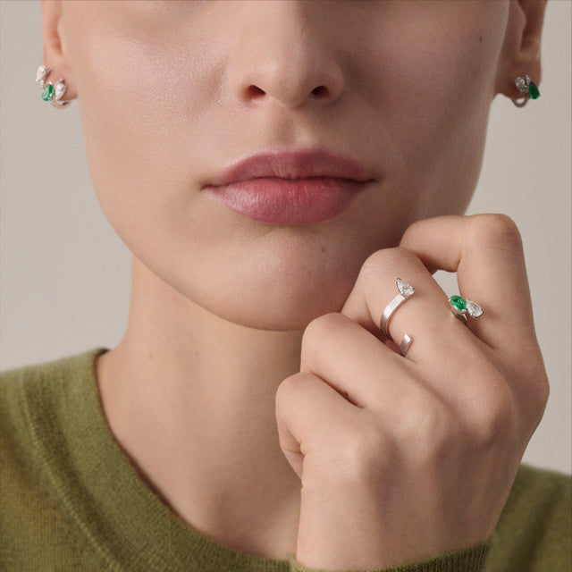 Repossi Serti Sur Vide Ring Set With 2 Diamonds And 1 Emerald