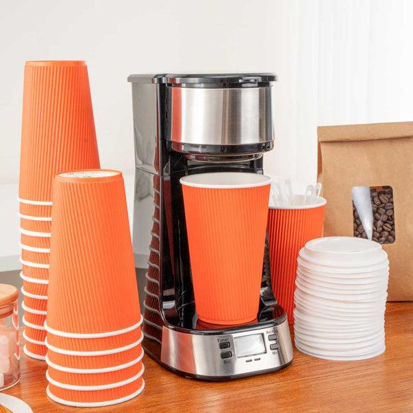 Restaurantware 16 Oz Tangerine Orange Paper Coffee Cup - Ripple Wall - 3 1/2" X 3 1/2" X 5 1/2" - 500 Count Box