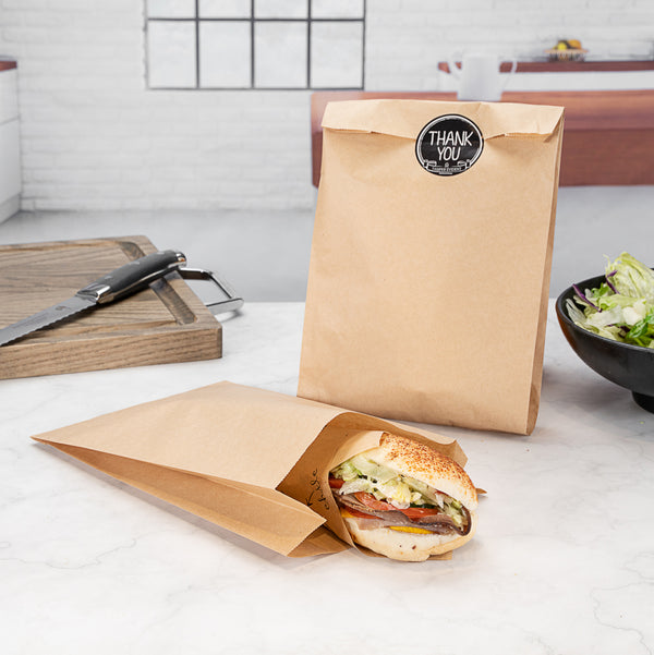 Restaurantware Bag Tek Kraft Paper French Fry / Snack Bag - 7" X 3" X 11" - 100 Count Box