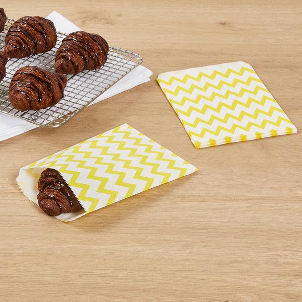 Restaurantware Bag Tek Rectangle Yellow Paper Bag - Zig Zags - 7" X 5" - 100 Count Box