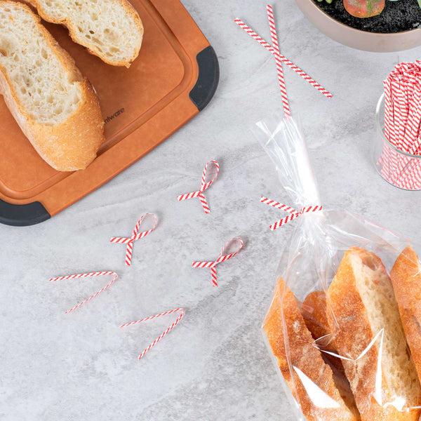 Restaurantware Bag Tek Red Stripe Paper Twist Tie / Bag Tie - Laminated - 4" - 50000 Count Box