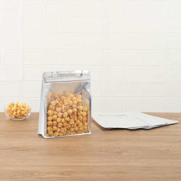 Restaurantware Bag Tek White Plastic Large Snack Bag - Double Seal Rip Lock Heat Sealable - 9 1/2" X 7 1/2" X 2 3/4" - 100 Count Box