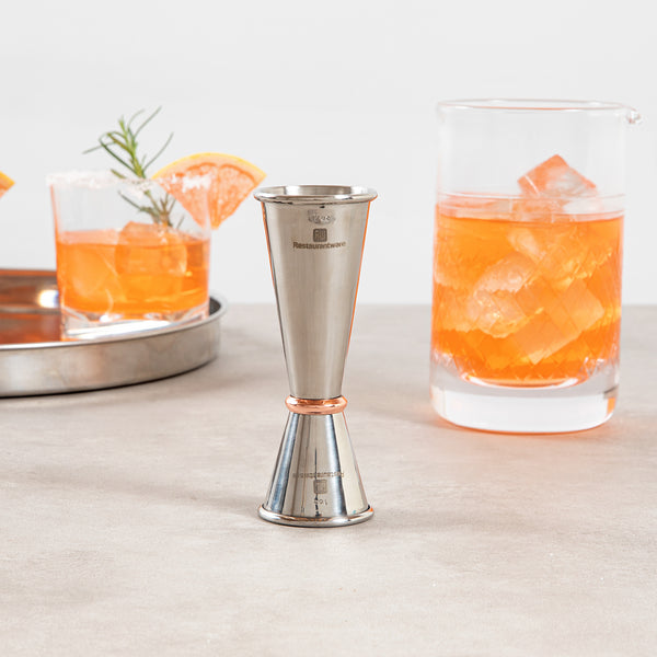 Restaurantware Bar Lux 1 Oz / 2 Oz Stainless Steel Jigger - Japanese Style Mirrored Finish Copper-Plated Ring - 1 Count Box