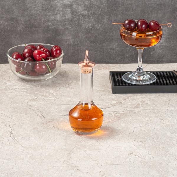 Restaurantware Bar Lux 4 Oz Glass Modern Style Bitters Bottle - Copper-Plated Dasher - 5 3/4" X 2 3/4" X 2 3/4" - 1 Count Box