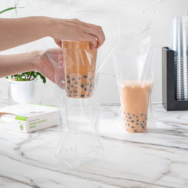 Restaurantware Basic Nature Clear Plastic Drink Carrier Bag - Fits 1 Cup Biodegradable - 6 1/4" X 3 1/4" X 11" - 100 Count Box
