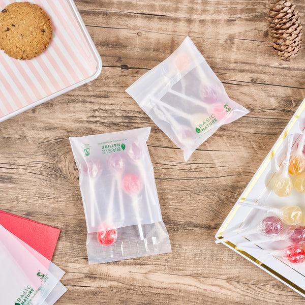 Restaurantware Basic Nature Translucent PLA Plastic / PBAT Lip And Tape Bag - Self-Sealing Compostable - 4 3/4" X 4" - 100 Count Box