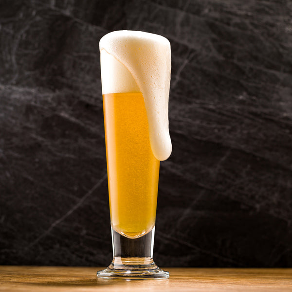 Restaurantware Bev Tek 14 Oz Pilsner Glass - Tall-Footed - 2 1/2" X 2 1/2" X 9 1/2" - 12 Count Box