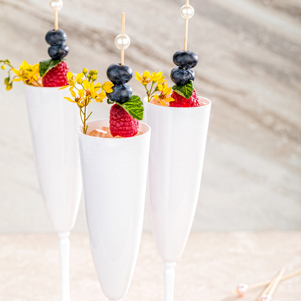 Restaurantware Bev Tek 4 Oz White Plastic Wedding Champagne Flute - 1-Piece - 2 1/4" X 2 1/4" X 7 1/2" - 100 Count Box