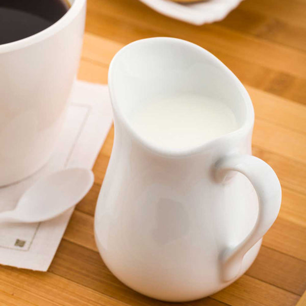 Restaurantware Chef 101 4 Oz Round White Porcelain Classic Cream Cup - 3" X 2 1/2" X 3 1/4" - 1 Count Box