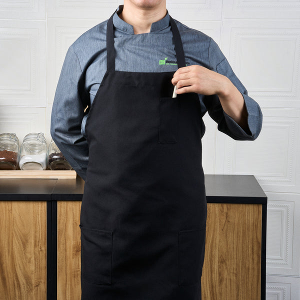 Restaurantware Chef 101 Black Standard Bib Apron - With 3 Pockets - 32 1/2'' X 27 1/2'' - 100 Count Box