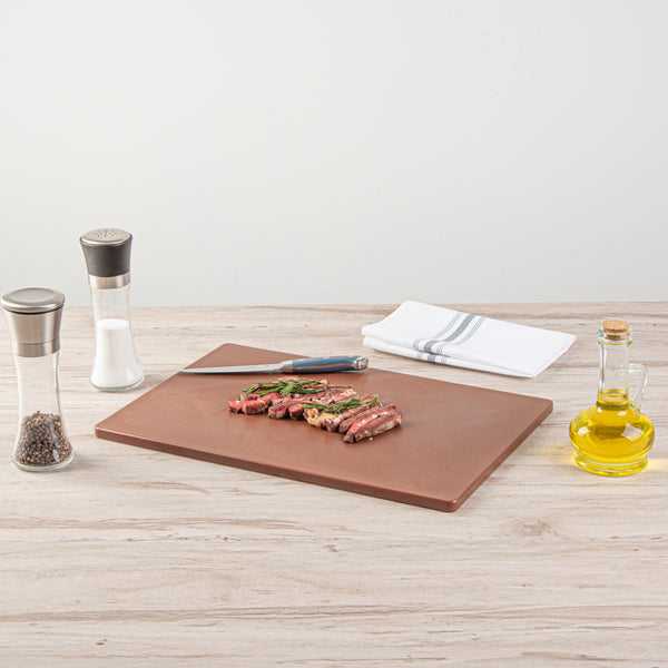 Restaurantware Chef 101 Brown Plastic Cutting Board - 18" X 12" - 10 Count Box
