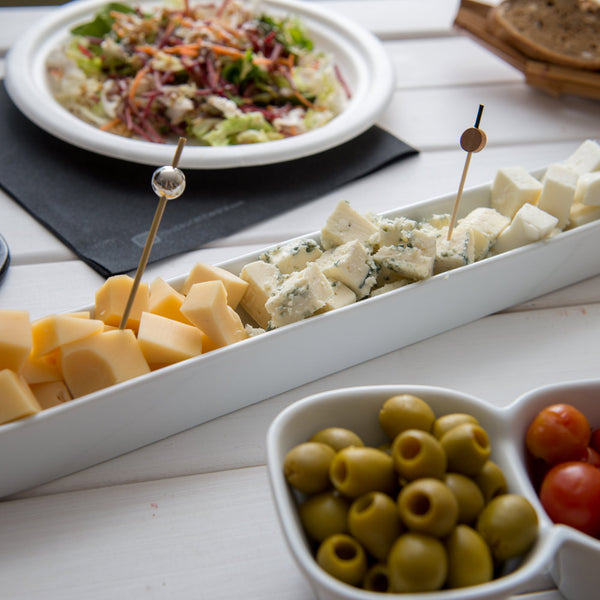Restaurantware Chef 101 Siluro 10 Oz White Porcelain Olive Plate - 12" X 1 1/2" X 1" - 1 Count Box